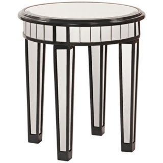 accent table. Round top. Black lacquer trim. 20 wide. 23 high