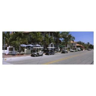 Wall Art  Posters  Golf carts and cars parked on a