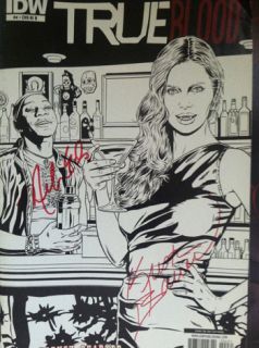 Kristin Bauer van Straten and Nelsan Ellis signed the cover of the