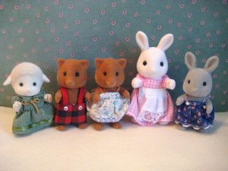 This lot is for 5 figures from the Sylvanian Families/ Calico Critters