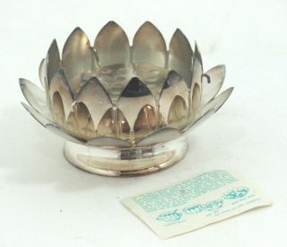 Now to the store shelf comes this Leonards Lotus Bowl Centerpiece.