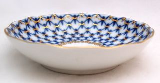 Lomonosov Porcelain Cobalt Net Jam Saucer measures 4 H x 1 D. The