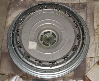 You are bidding on an NOS Spoked 15 Hubcap for a 1984 Oldsmobile