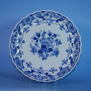 We have a large collection of antique Dutch tiles and Delftware in our