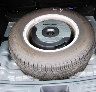 rim of a spare wheel so the space in the trunk can be saved for cargo