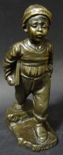 Picciole , Bronze, Junge mit Schulheften, H 20 cm (194/10067)
