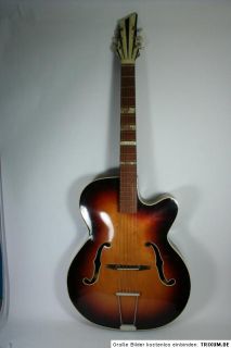 Die Gitarre ist 108cm lang,Griffbrettbreite am ersten Bund 4,5cm