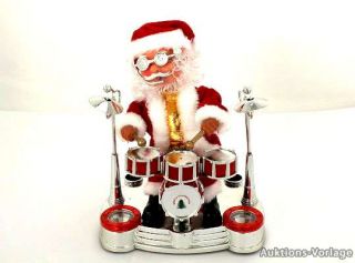 Weihnachtsmann singt Weihnachtsmann mit Schlagzeug Musikinstrument